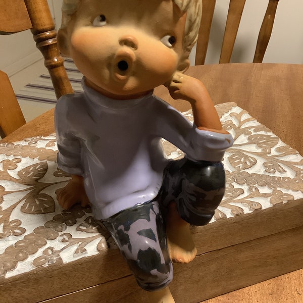 Shelf Sitter Boy Home Decor made in Japan good pre-owned condition no chips or cracks ceramic purple shirt, black and purple pants