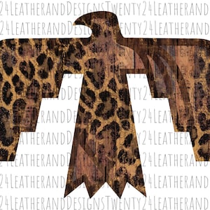 May include: A brown and gold eagle silhouette with a leopard print pattern on a woodgrain background.