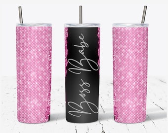 May include: Three stainless steel tumblers with lids and straws. The tumbler in the center has a black background with the text "Boss Babe" in silver glitter. The tumblers on the left and right have a pink glitter background.