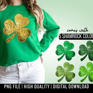 May include: A green sweatshirt with a gold glitter shamrock design. The text "comes with 5 shamrock colors" is displayed below the sweatshirt.