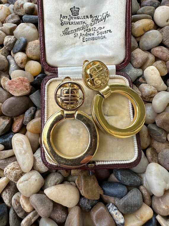 CASSIS DOORKNOCKER CLIP ON GOLD
