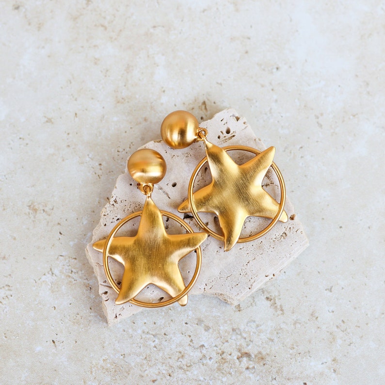 Stunning Anne Klein Couture Star Shaped Matte Gold Tone Brushed Drop Dangle Clip On Earrings image 1