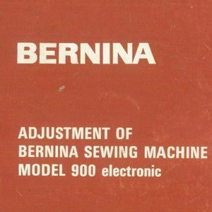 May include: Red cover of a Bernina sewing machine instruction manual. The title reads "Adjustment of Bernina Sewing Machine Model 900 electronic". The bottom of the cover reads "Fritz Gegauff Ltd. Bernina Sewing Machines Steckborn TG/Switzerland".
