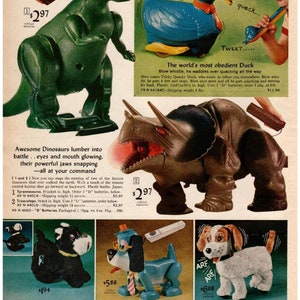 May include: Vintage toy advertisement featuring several battery-operated toys. A green Tyrannosaurus Rex and a brown Triceratops are displayed. A blue duck toy with an orange hat and a white dog toy are also shown. The toys are from Japan.