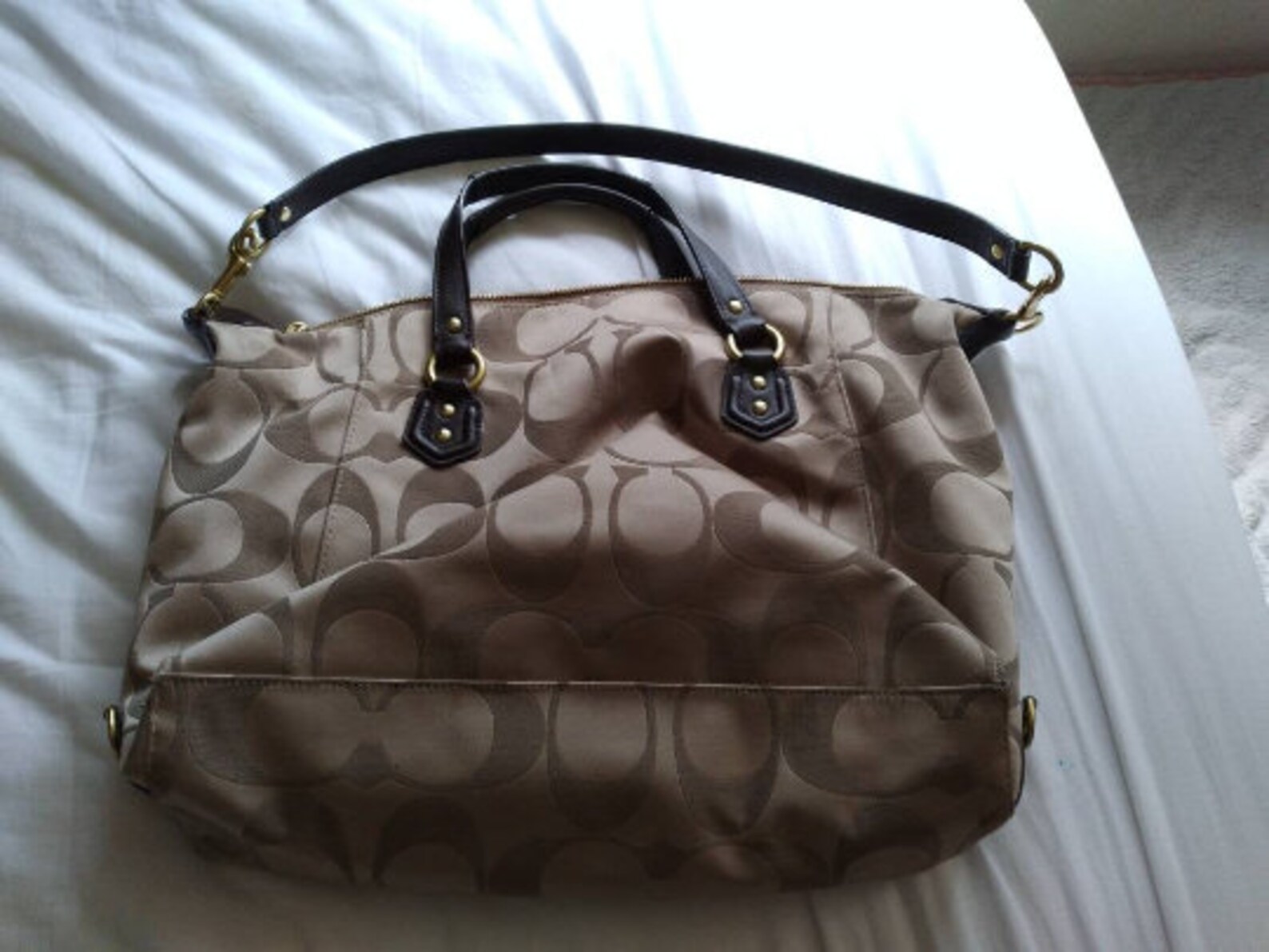 cream colored coach bag