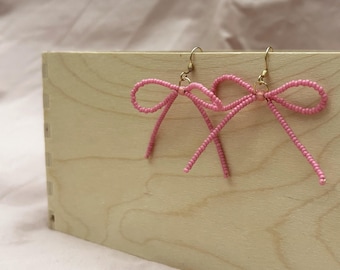 Pink bow bead earrings
