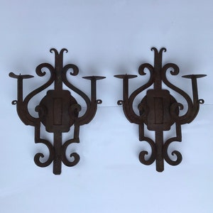 Antique gothic cast iron wall sconces.Medieval Renaissance. 16’’ Candle holders.  Heavy large. AS IS.