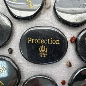 Protection: Natural Hematite Engraved Palm Stone | Crystal Pocket Stone