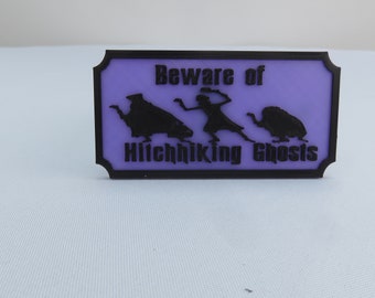 Beware of Hitchhiking Ghosts, inspired by Disney's Haunted Mansion. Fridge magnet