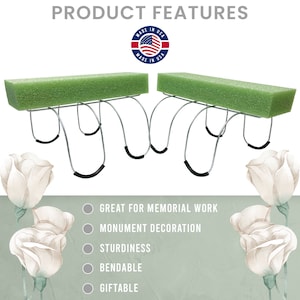 May include: Two green floral foam blocks with metal frames. The frames have black rubber grips. The foam blocks are on a white background. The text "GREAT FOR MEMORIAL WORK", "MONUMENT DECORATION", "STURDINESS", "BENDABLE", and "GIFTABLE" are listed below the foam blocks.
