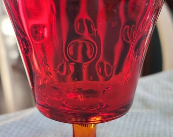 Ruby red drinking glass
