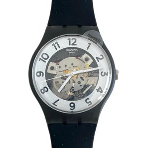 Swatch New Gent SKELETOR SUOB134 – neuwertiger Zustand – läuft mit neuer Batterie – Originalverpackung – 41 mm Durchmesser – neu im Karton