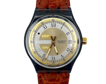 Vintage 1994 Swatch Musicall SAX SLM102 - unworn mint condition - fresh battery installed - new in box - 34mm diameter