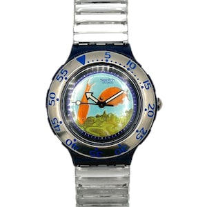 Swatch Scuba200 DECOMPRESSION SDN112 1994: reloj vintage con temática de peces dorados y correa flexible de metal.
