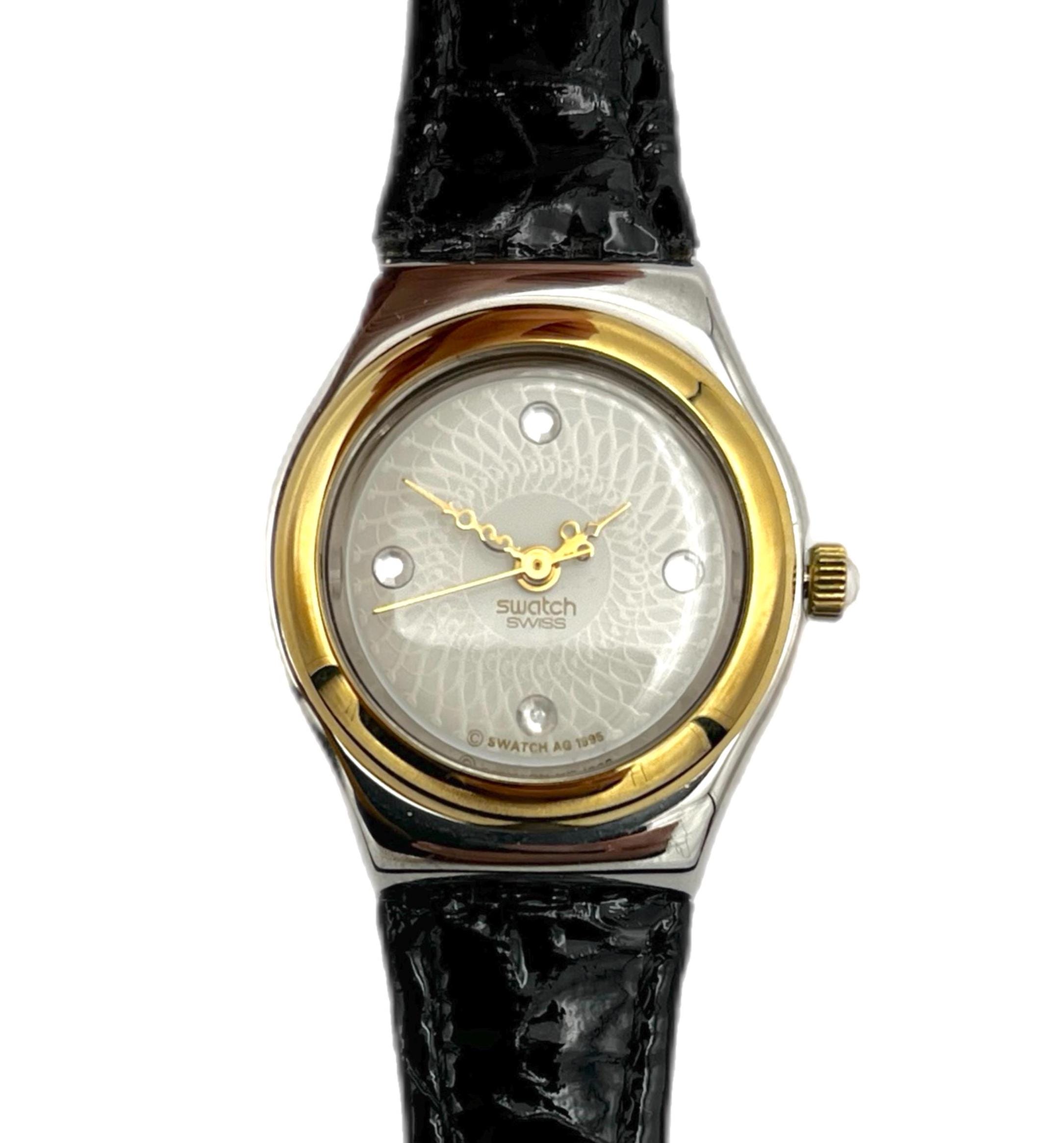 Swatch  Swiss Irony Lady Reverence Black band and Gold  Rim Classic Timepiece LB170E - LADY BLACK SINGLE - Swatch® United States main image 2