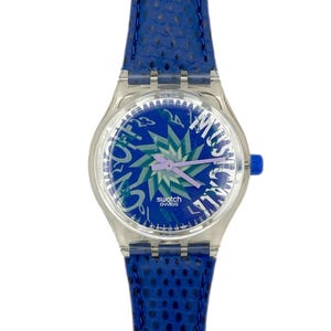 Swatch Musicall TONE IN BLUE SLK100 1993 - Sin usar, en perfecto estado - 34 mm de diámetro - batería nueva - correa de piel azul - nuevo en caja
