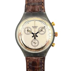 1991 Swatch Chrono GOLDFINGER SCM100 - unworn mint vintage condition - running with new battery - 37mm