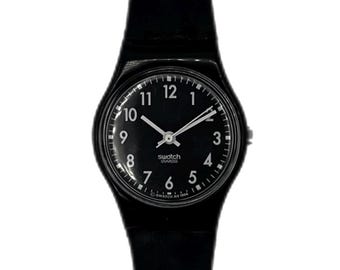 1995 Swatch Lady LITTLE SEVEN LB139  - unworn mint running condition 25mm diameter vintage black Swatch watch