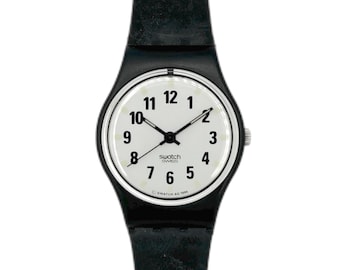 1996 Swatch Lady MISS LB142 - unworn mint running condition 25mm diameter vintage black Swatch watch