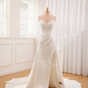 High quality satin 2-in-1 dress. Mermaid wedding dress with convenient detachable skirt. Sexy strapless wedding dress.