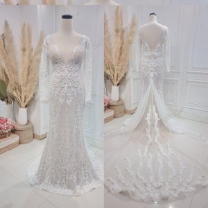 High quality lace mermaid wedding dress. Deep V-neck wedding dress with sexy open back. Long sleeve wedding dress for winter.