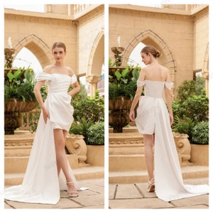 Custom short wedding dress for the bride. Elegant satin short wedding dress. With off shoulder sleeves.