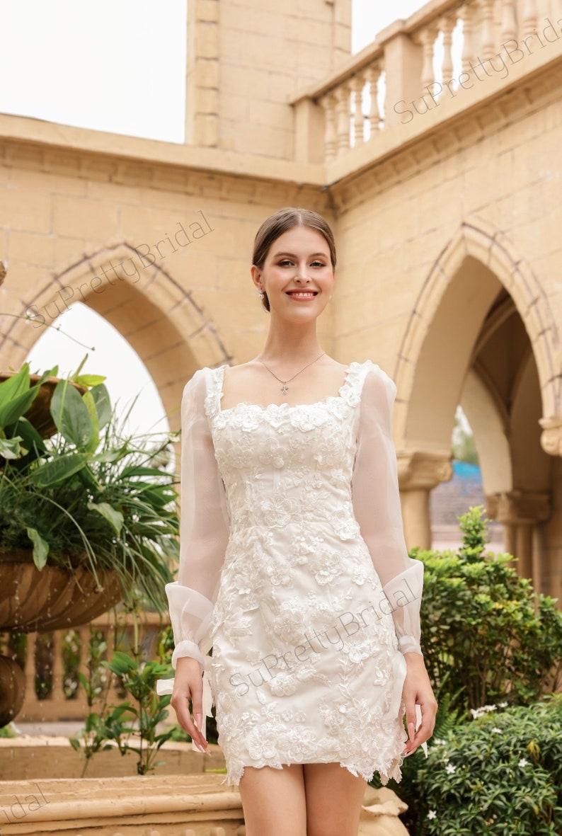 Custom wedding dress for bride. Short wedding dress with beautiful long sleeves. Short wedding dress with elegant floral decoration. image 3