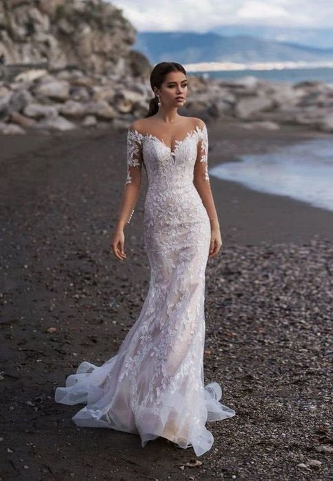 Mermaid wedding dress with glamorous sheer back. Off the image 3