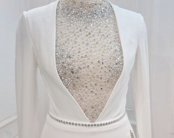 Sexy crepe wedding dress. Deep v-neck wedding dress. Sparkling beaded wedding dress. Sexy long sleeve wedding dress