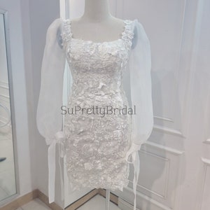 Custom wedding dress for bride. Short wedding dress with beautiful long sleeves. Short wedding dress with elegant floral decoration. image 9