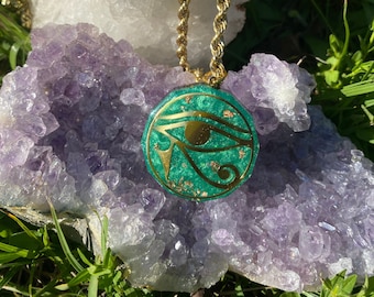 Eye of Horus Reiki charged orgonite pendant with Quartz crystals copper alluminum powder and Heavy metal shavings EMF/ELF & 5G Protection