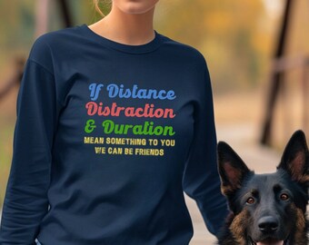May include: A navy blue long-sleeved sweatshirt with the text "If Distance, Distraction & Duration mean something to you, we can be friends." in colorful letters.