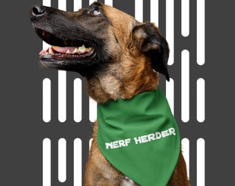 May include: A brown and black dog wearing a green bandana with the text "NERF HERDER" in white letters. The dog is looking up and has its mouth open.