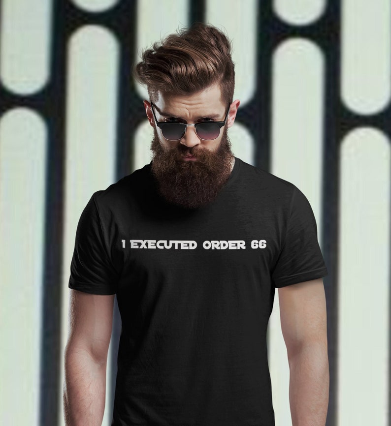 May include: A black t-shirt with the text "I EXECUTED ORDER 66" printed in white on the front.