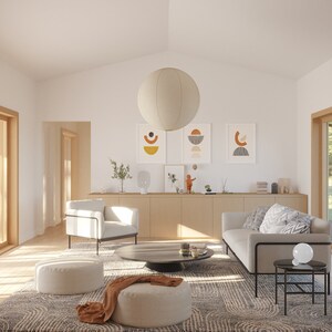 May include: A bright, airy living room with a neutral color palette. Features include a gray sofa, white armchairs, a round coffee table, and a patterned rug. Artwork and a large paper lantern add decorative touches. Wooden sliding doors lead to an outdoor view.