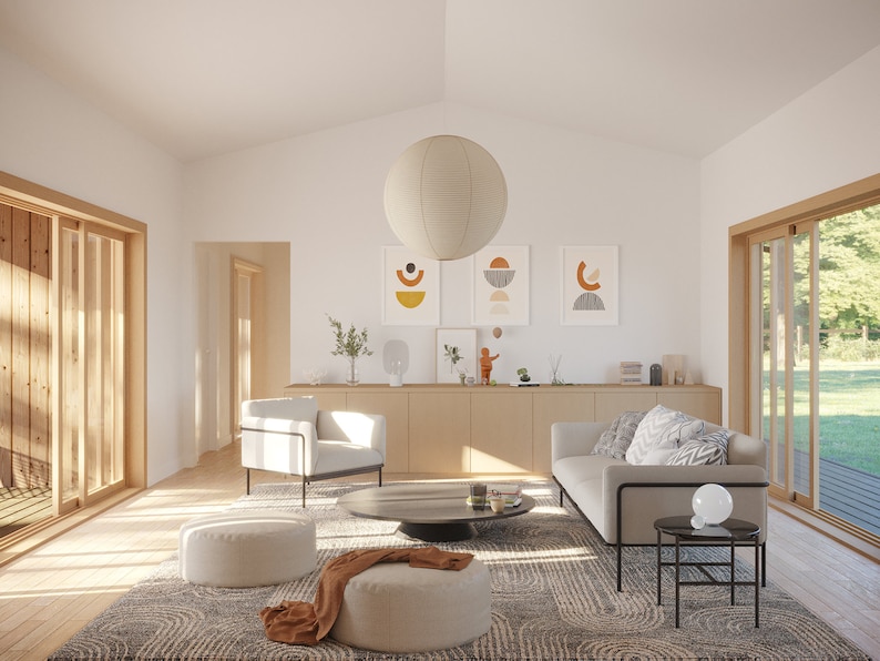 May include: A bright, airy living room with a neutral color palette. Features include a gray sofa, white armchairs, a round coffee table, and a patterned rug. Artwork and a large paper lantern add decorative touches. Wooden sliding doors lead to an outdoor view.