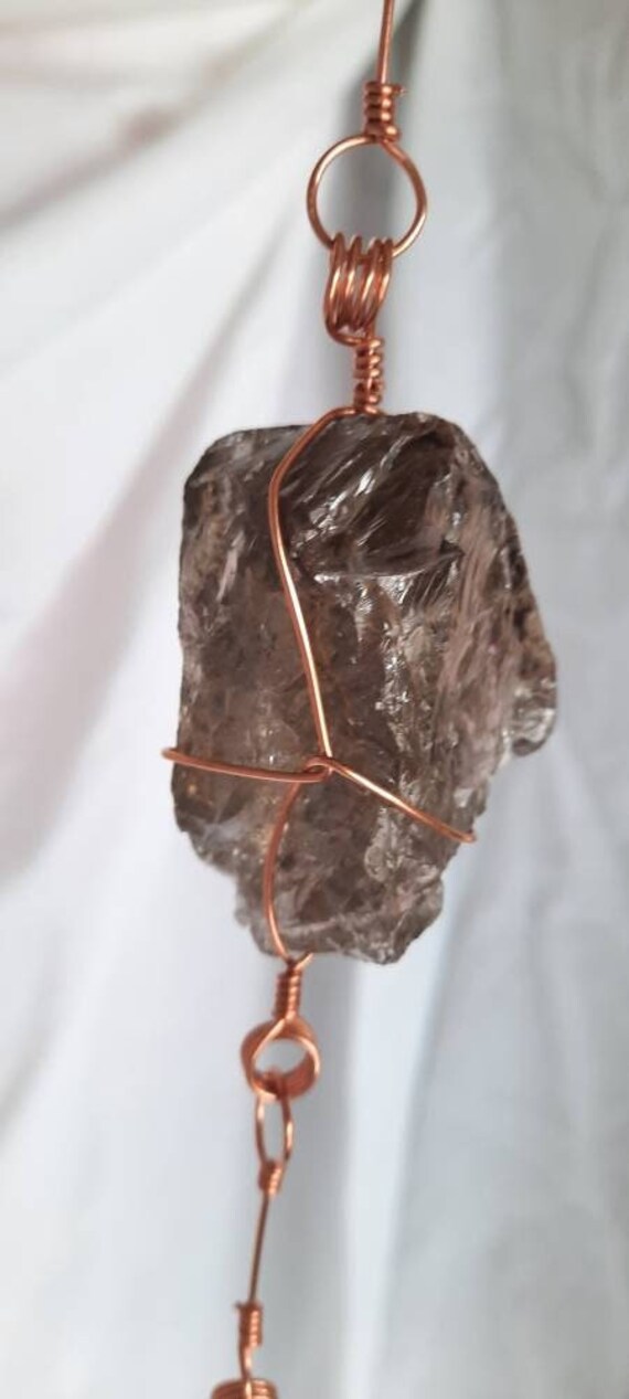Copper outlet wrapped crystals