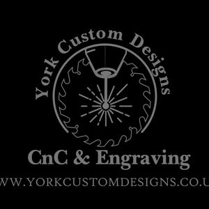 May include: Black background featuring the text "York Custom Designs" in a circular design, with a saw blade graphic. Below, it reads "CnC & Engraving" and the website address.