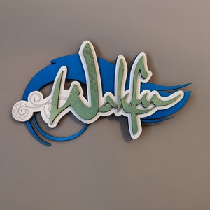 Logo Wakfu in legno 3D.