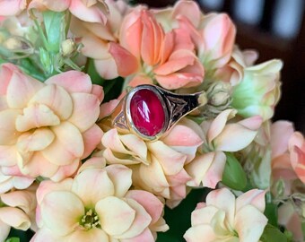 Glowing ruby cabochon 9ct gold signet style ring