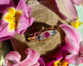 Vibrant antique 18ct gold ruby, diamond and paste set navette ring