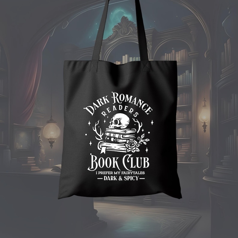 May include: Black tote bag with white text and graphics. The design includes the words "Dark Romance Readers Book Club" with a skull, books, and a rose. The text "I prefer my fairytales - dark & spicy -" is also included.