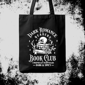 May include: Black tote bag with a white graphic featuring a skull atop a stack of books, a rose, and the text "Dark Romance Readers Book Club." The phrase "I prefer my fairytales - Dark & Spicy -" is also included.