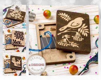 May include: Wooden needle holder with a magnetic closure. The holder features a design of a bird on a branch with berries. The text "NEEDLE 4 DESIGNS HOLDER" is printed on the front of the holder.