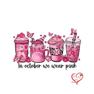 May include: Four pink cups with different designs and toppings, including a pink ribbon, a butterfly, and a pumpkin. The cups are arranged in a row and the text "In october we wear pink" is below them.