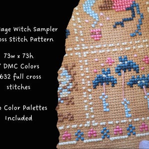 Puede incluir: Un patr&oacute;n de punto de cruz titulado "Cottage Witch Sampler" con un dise&ntilde;o detallado que presenta paraguas azules, flores rosas y otros elementos decorativos. El patr&oacute;n tiene 73 puntos de ancho y 73 puntos de alto, utilizando 7 colores DMC. El texto indica que se incluyen dos paletas de colores.