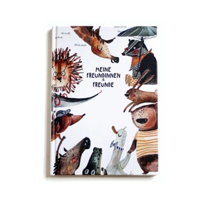 Könnte beinhalten: Ein Buchcover mit weißem Hintergrund und bunten Illustrationen von Tieren. Der Titel des Buches lautet "Meine Freundinnen & Freunde".