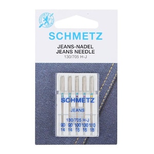 Könnte beinhalten: Eine Packung SCHMETZ JEANS NEEDLE Nähmaschinennadeln. Das Paket enthält fünf Nadeln in den Größen 90/14, 100/16 und 110/18. Diese Nadeln sind für Jeans und andere schwere Stoffe konzipiert.