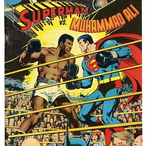 May include: A vintage comic book cover titled Superman vs. Muhammad Ali, featuring the two figures boxing in a ring. The text reads THE FIGHT TO SAVE EARTH FROM STAR-WARRIORS and $2.50. The background shows a crowd and space with planets.