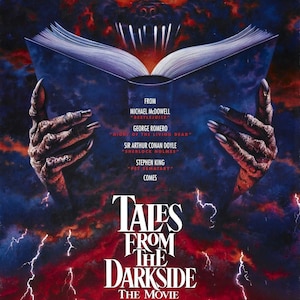 May include: Movie poster for Tales from the Darkside: The Movie. The poster features a monstrous hand holding a book open, with a creature's face peering out from the pages. The creature has glowing red eyes and sharp teeth. The poster is set against a dark, stormy sky with lightning bolts.
